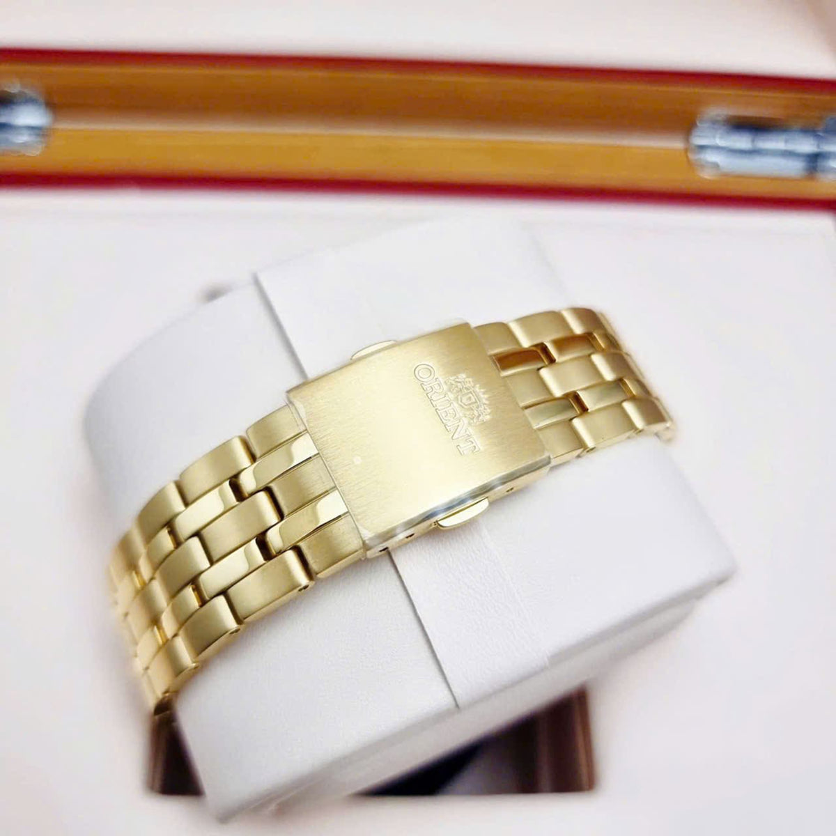 Gold-tone steel watch bracelet with folding clasp