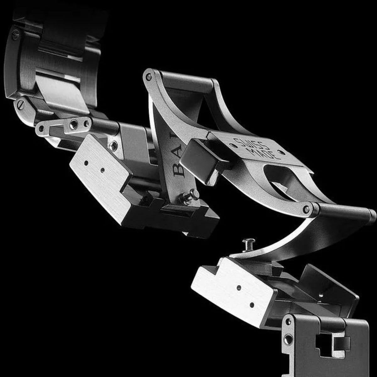 Stainless steel watch bracelet links and fold-over clasp with visible hardware
